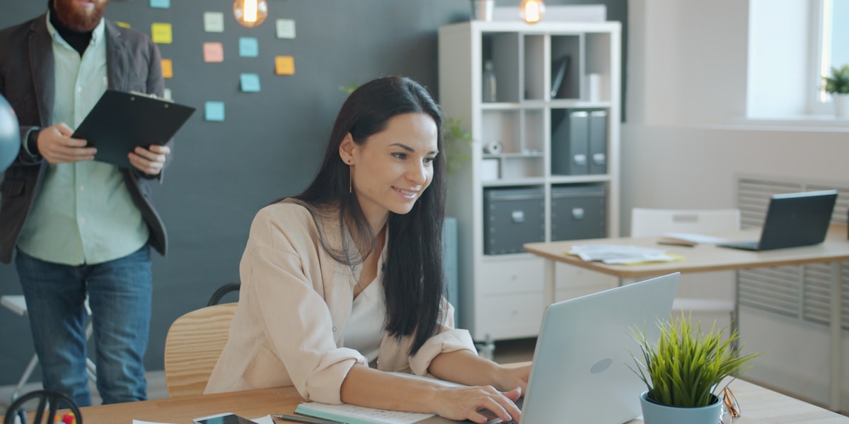Financial compliance documents and business records on a desk