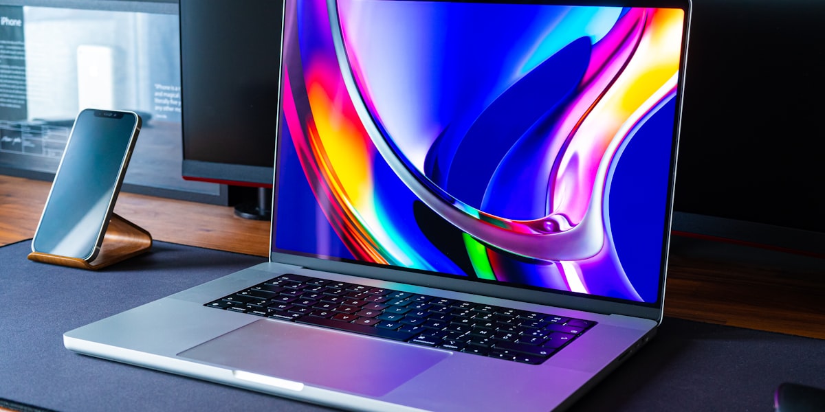 Insurance professional using laptop for claims documentation