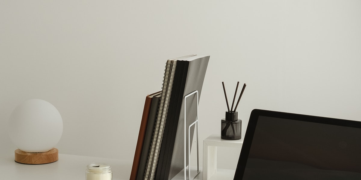 Minimal desk setup with a laptop and accessories