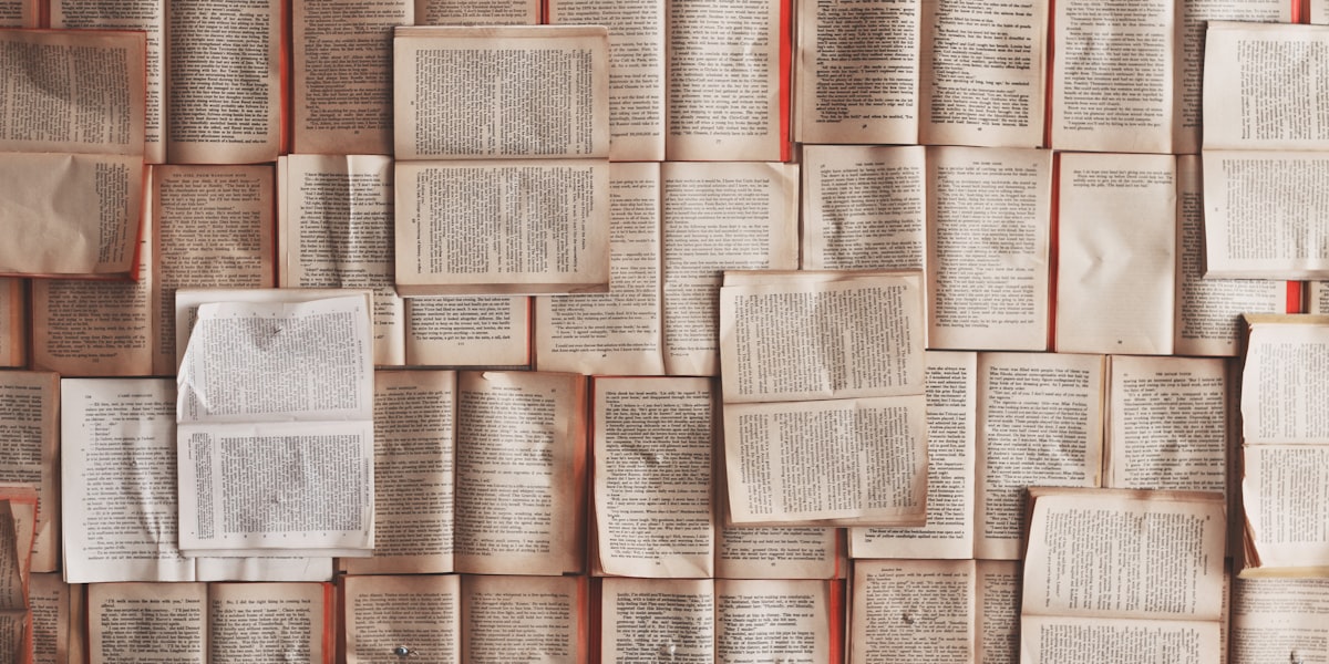 Open books on a desk showing specialized text
